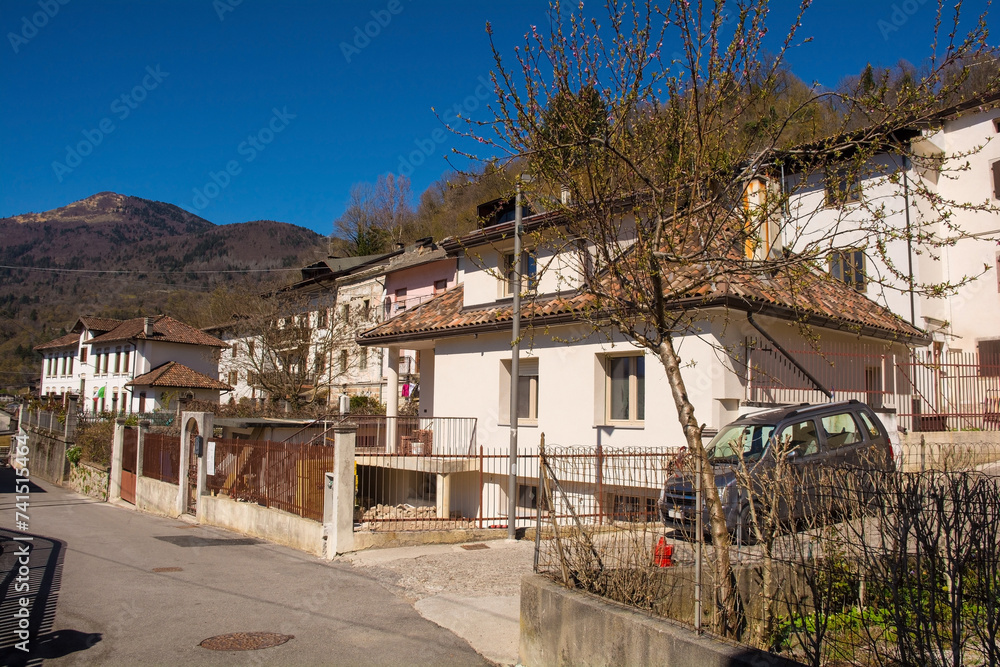A residential street in the mountain village of Cedarchis near Arta Terme in Carnia, Friuli-Venezia Giulia, north east Italy A residential street in the mountain village of Cedarchis near Arta Terme in Carnia, Friuli-Venezia Giulia, north east Italy