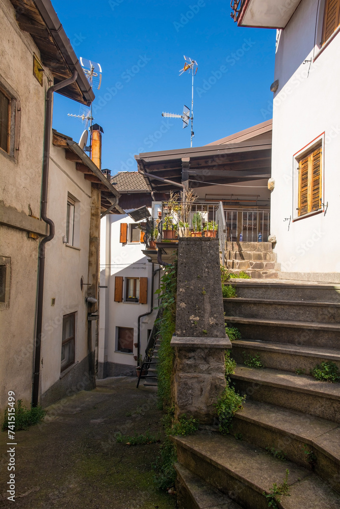 Fototapeta premium Historic stone houses in the mountain village of Cedarchis near Arta Terme in Carnia, Friuli-Venezia Giulia, north east Italy