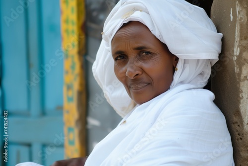 ethiopian woman in a white habesha kemis at timkat photo