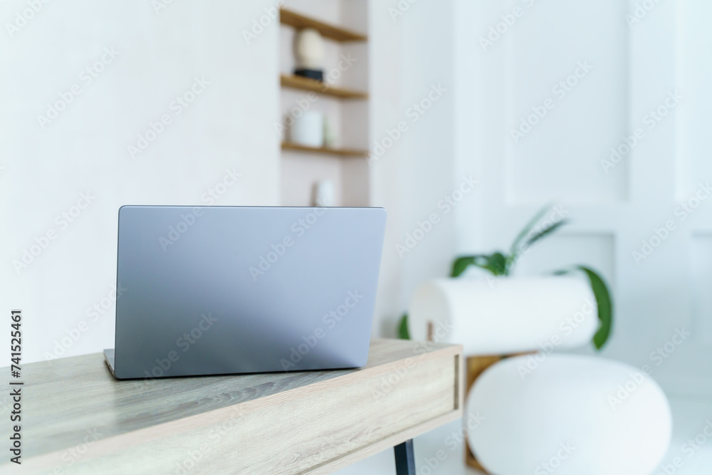 Laptop on the side on the table, Back to school and online shopping concept, online work from home Laptop on the side on the table, Back to school and online shopping concept, online work from home