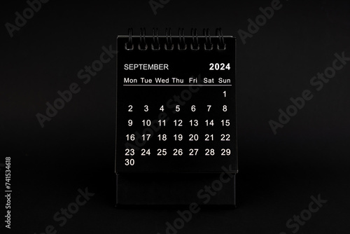 Black Calendar for September 2024. Desktop calendar on a black background.