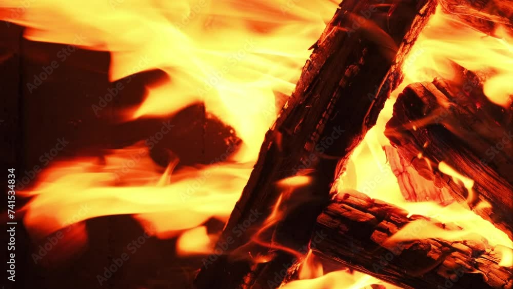 Fireplace. Beautiful slow motion of vivid fire flame over wooden logs. Cozy relaxing background TV Screen Saver. Fireplace with Flames Christmas Holidays Concept. Video for Meditation Vertical video Fireplace. Beautiful slow motion of vivid fire flame over wooden logs. Cozy relaxing background TV Screen Saver. Fireplace with Flames Christmas Holidays Concept. Video for Meditation Vertical video