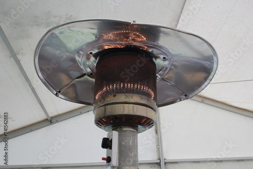 gas burner in an awning tent. Outdoor heating.