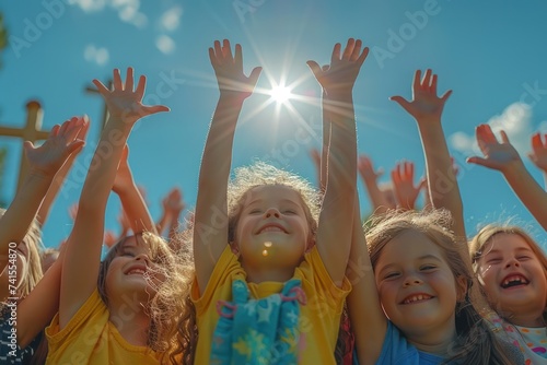 Children hands worship hope with Cross © Attasit