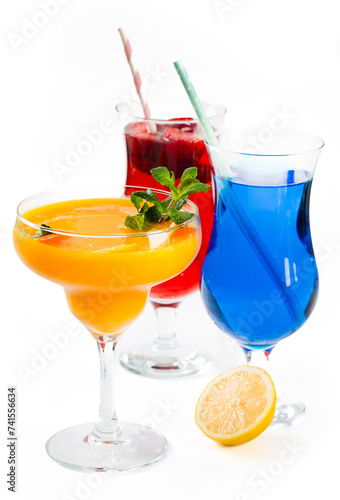 Variety of fruit drinks with lemons and strawberries