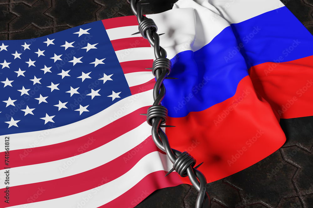 American and Russian national flags separated by a silver metal barbed ...