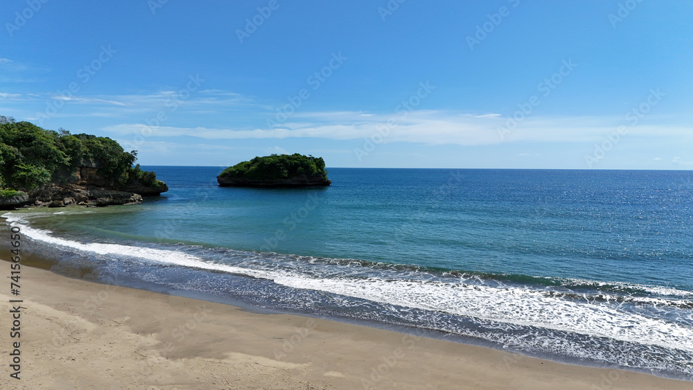 Aerial landscape view of tropical summer palm trees shadows on sandy coast ocean waves splash crash. Beautiful top view sunny sea coast, exotic amazing nature landscape Aerial landscape view of tropical summer palm trees shadows on sandy coast ocean waves splash crash. Beautiful top view sunny sea coast, exotic amazing nature landscape