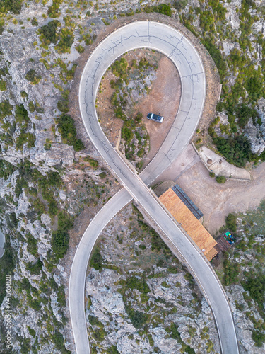 aerial view of the Nus de Sa Corbata hairpin turn in the Serra Tramuntan of Mallorca near Coll de Reis mountain pass