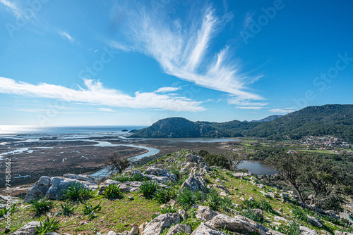 Scenic views from Kaunos and Dalyan, a city of ancient Caria, west of the modern town of Dalyan and The Calbys river ( Dalyan river) which was the border between Caria and Lycia in Muğla, Turkey photo