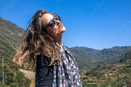 Young woman Embraces find peace Amid the Merida Venezuelan Mountains Splendor photo
