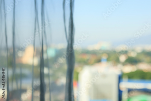 Abstract blur curtain window with city background