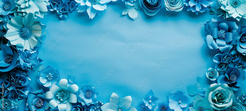 Obraz premium Blue paper flowers background with place for text title with blue background for banner post greating card background