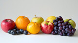 Assortment of Fresh, Colorful Fruits on a Neutral Background