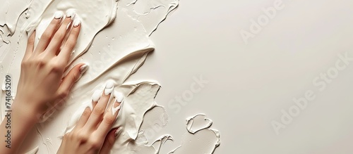 Female hands and moisturizi...