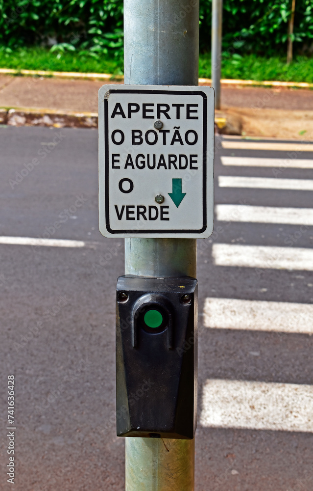 Warning sign in portuguese informing Warning sign in portuguese informing