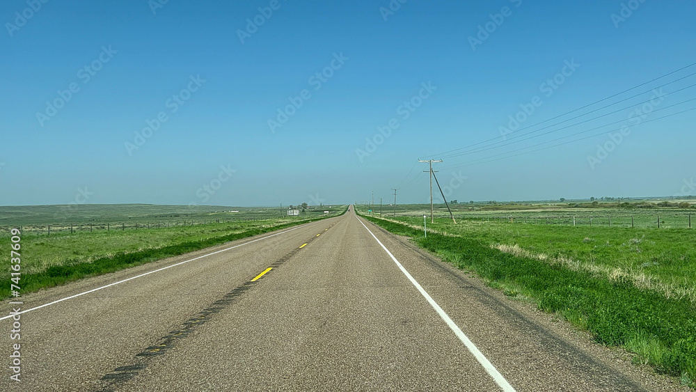 Fototapeta premium Driving through the agricultural area along Highway 2 in Montana.