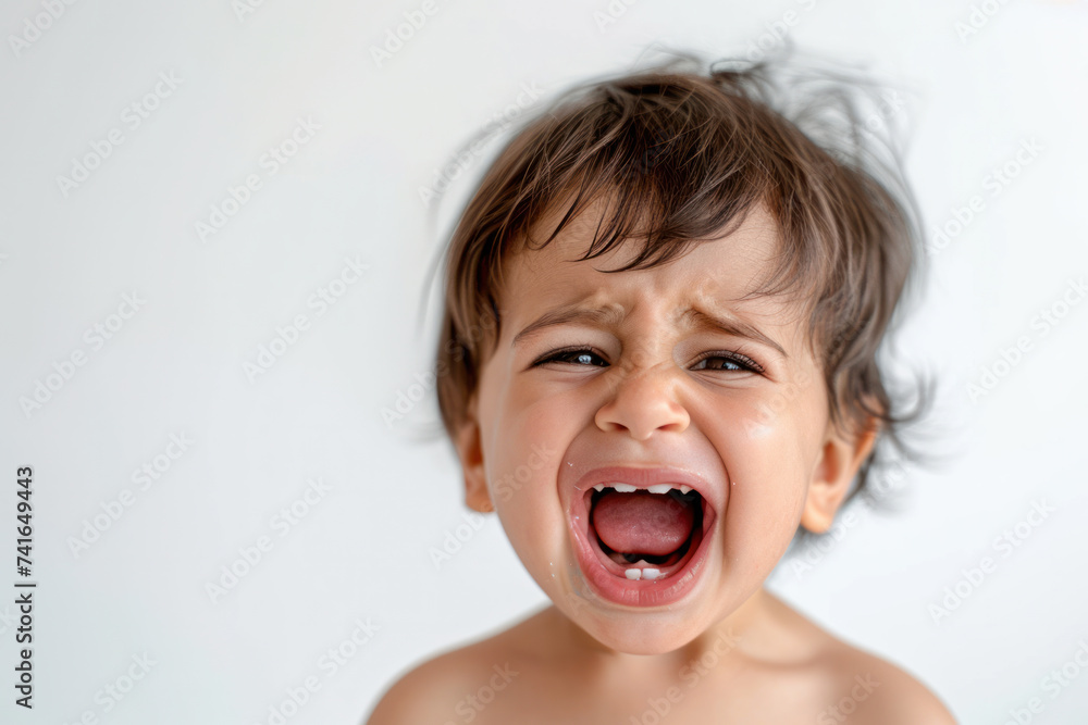 Toddler boy crying with expression of sadness and frustration. Child emotions. Toddler boy crying with expression of sadness and frustration. Child emotions.