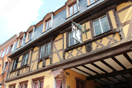 half-timbered house (preiss-zimmer) in a village (riquewihr) in alsace in france