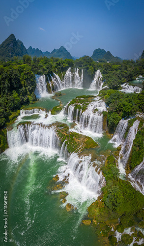 Aerial view of Detian Transnational Waterfalls along the river at Moon Hill Yangshuo valley, Chongzuo City, Yangshuo County, Guilin, Guangxi Zhuang Autonomous Region, China. photo