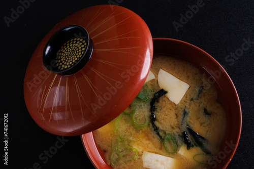 Miso soup traditional Japanese food with tofu isolated in black background