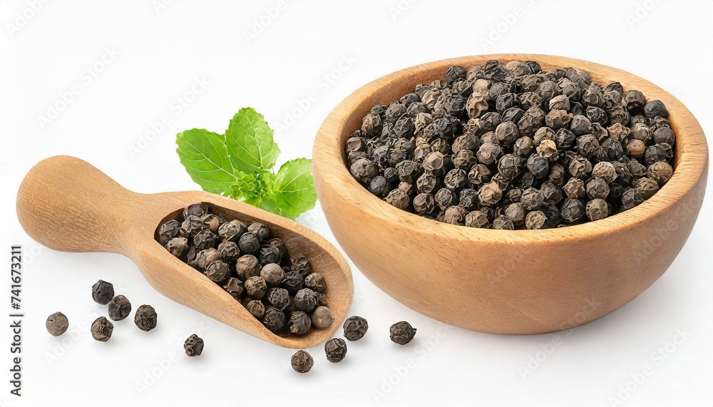 Black peppercorns (Black pepper) in wooden bowl isolated on white background Black peppercorns (Black pepper) in wooden bowl isolated on white background
