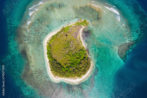 Aerial Top Down View of Unknown Island in Bismarck Sea, Wewak, East Sepik Province, Papua New Guinea. photo