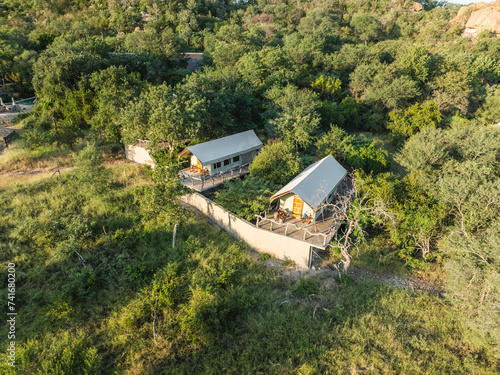 Aerial view of luxury resort bungalows in the south African savanna (Biome), Balule Nature Reserve, Maruleng, Limpopo region, South Africa. photo