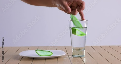  video of aloe vera being cut and chopped on wooden chopping board and washed in water