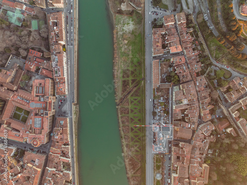 Aerial view of Terzo Giardino, a picturesque riverfront garden with beach along the Arno River in Florence downtown at sunset, Tuscany, Italy. photo