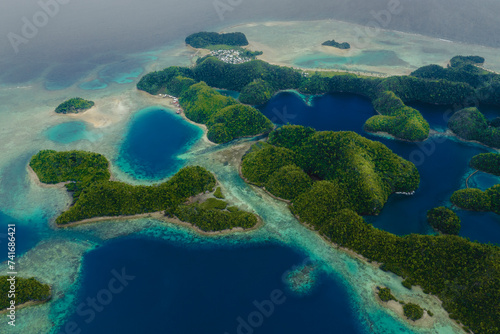 Aerial drone view of the coast of the Sugba Blue Lagoon in the Siargao island, Philippines. photo
