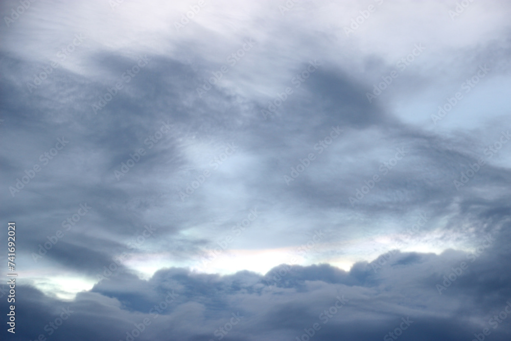 Obraz premium dark blue storm cloudy with white light sky background and city light twilight night evening time