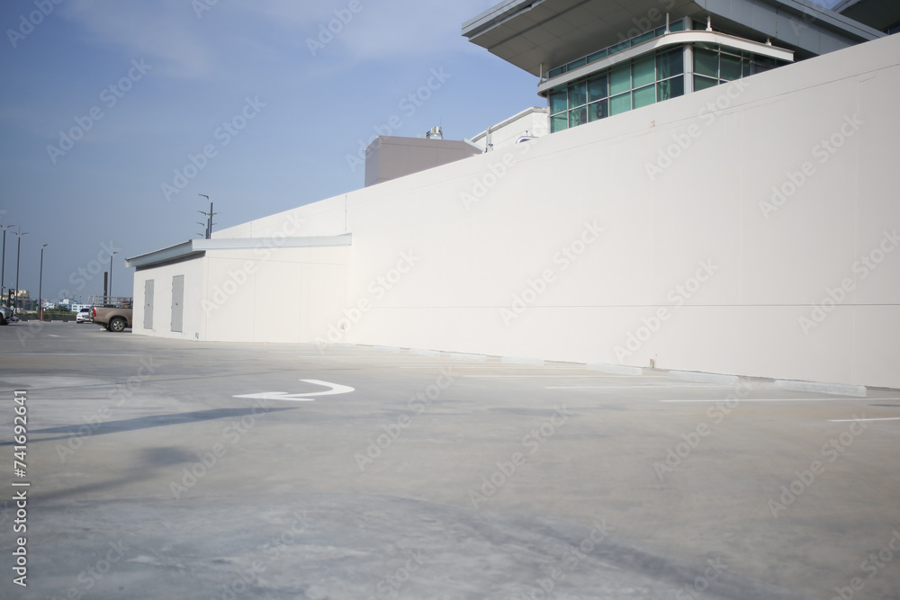empty rooftop car park building in summer day time background empty rooftop car park building in summer day time background
