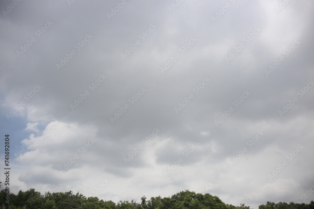 dark blue storm cloudy with white light sky background and city light twilight night evening time dark blue storm cloudy with white light sky background and city light twilight night evening time