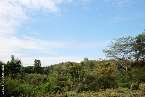 clear free sky cloud with sunlight day time with nature hills background 