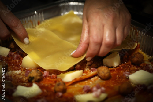 Photos Preparation ancient dish of Neapolitan tomato lasagna