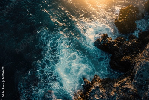 The sun illuminates the expansive ocean and a rocky landscape, Illuminating aerial portrayal of a sunlit sea contrasted against dark rocks, AI Generated