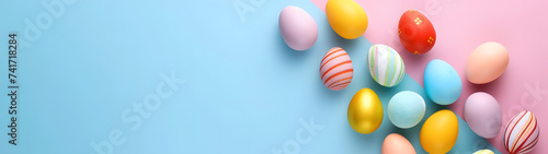Row of Colorful Easter Eggs on Blue and Pink Background