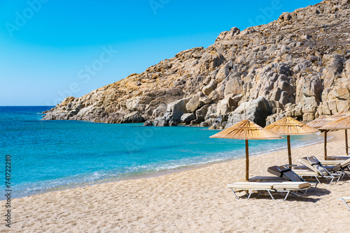 Fototapeta Naklejka Na Ścianę i Meble -  Mikonos, Greece: Agrari Beach with blue sea, wild and quiet, famous for diving, snorkeling and water activity. As most beaches in Mykonos, Agrari Beach is naturism friendly.
