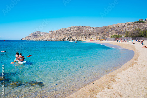 Mikonos, Greece: Agrari Beach with blue sea, wild and quiet, famous for diving, snorkeling and water activity. As most beaches in Mykonos, Agrari Beach is naturism friendly. photo