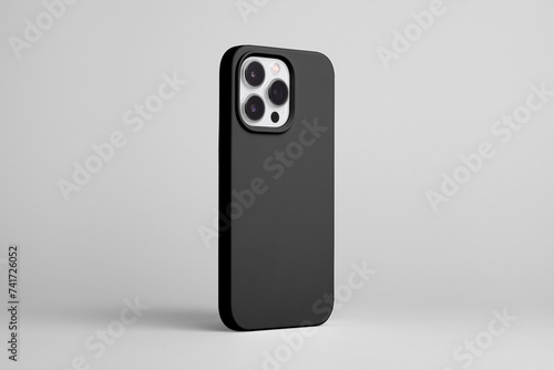 iPhone 15 pro in black case back side view isolated on grey background, smart phone mock up