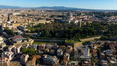 Aerial view of the Vatican City gardens located behind St. Peter's Basilica in Vatican in Rome, Italy. It's the most important and largest church in the world and residence of the Pope.