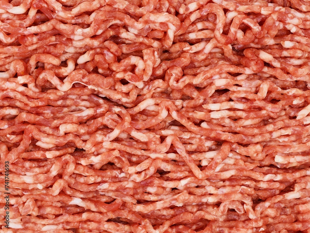 Fresh and raw minced pork and beef. Top view. Background. Fresh and raw minced pork and beef. Top view. Background.