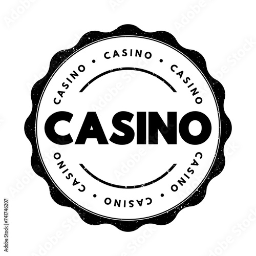 Casino - a public room or building where gambling games are played, text concept stamp
