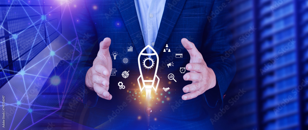 Startup business concept, rocket launching and flying from hand to sky ...