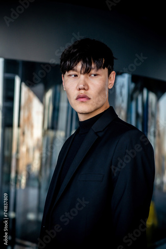 Portrait of handsome eastern man in luxury suit, fashion. Asia, oriental