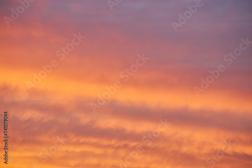 A captivating view of the sky at sunset, vibrant colors painting the clouds