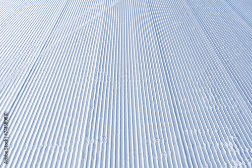 Obraz na plátně Freshly groomed snow - winter background and texture