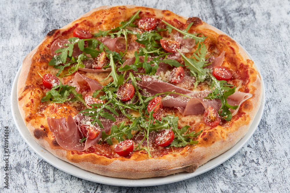 italian pizza on the white plate italian pizza on the white plate