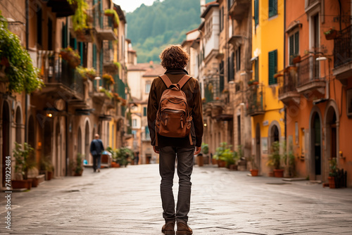 young traveler walking through the streets of an old town in italy or spain. Generative AI