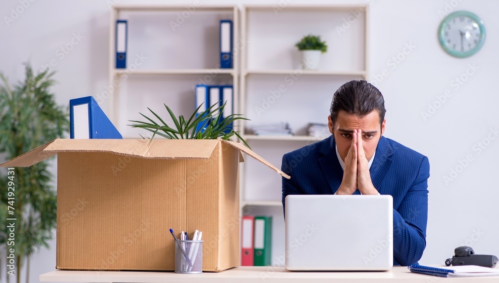 © Elnur - Young employee being made redundant © Elnur - Young employee being made redundant